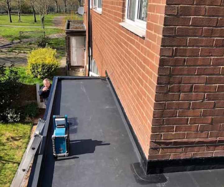 Finished installation of EPDM rubber flat roof over porch and garage