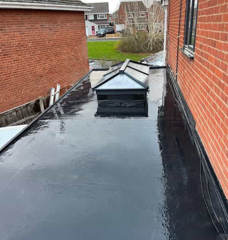 Finished EPDM rubber flat roof over garage